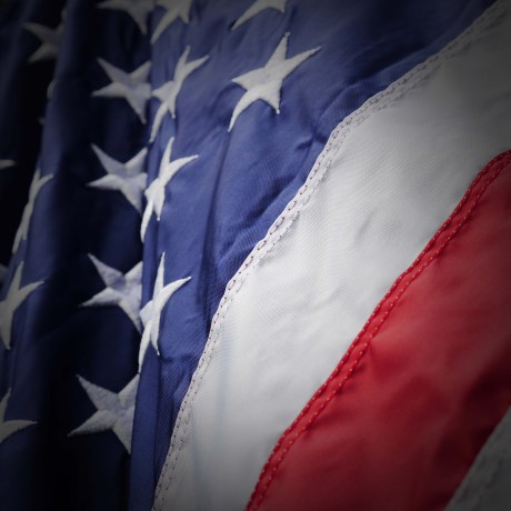 Preparing for the 4th of July with a new flag.